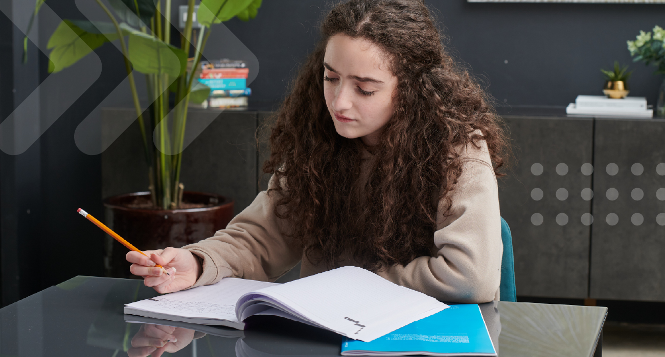 Girl studying on paper